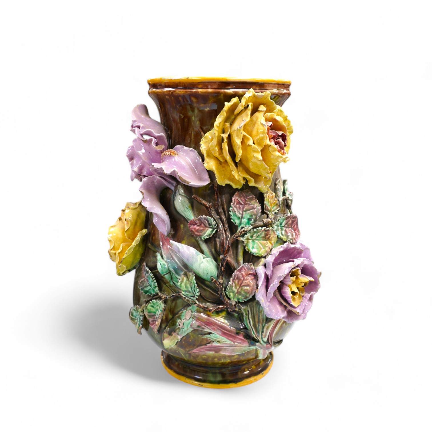 A large majolica floral decorated vase, 39cm. Condition - fair, several chips